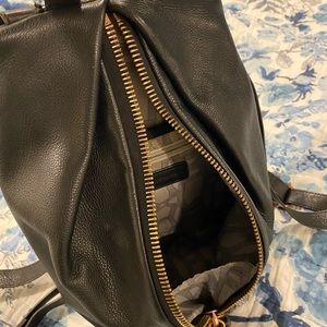 Leather backpack with large rose gold zip